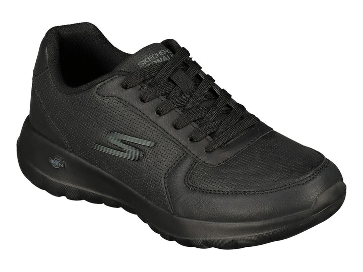 Tenis deportivos Skechers color negro con detalles de malla y suela gruesa.