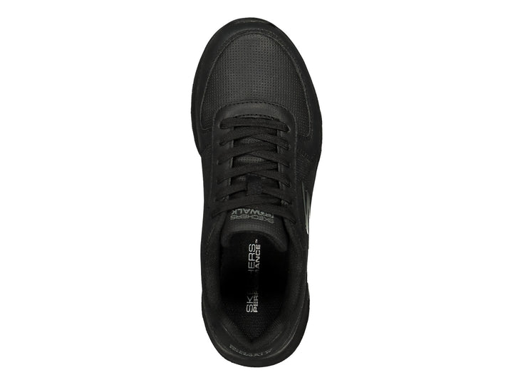 Tenis deportivos Skechers color negro con detalles de malla y suela gruesa.