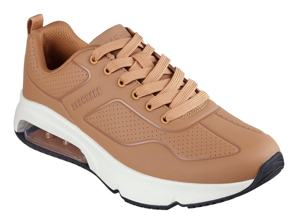 Tenis Skechers color café con suela blanca gruesa y cámara de aire visible en el talón.