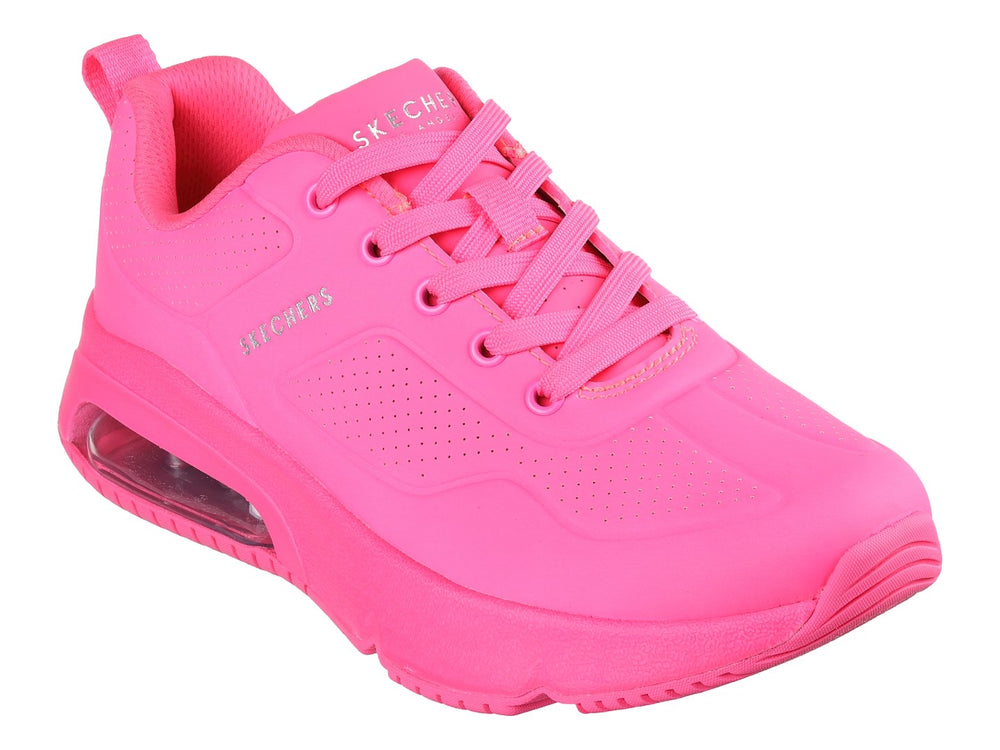Tenis deportivos Skechers color fucsia con amortiguación de aire visible en la suela.