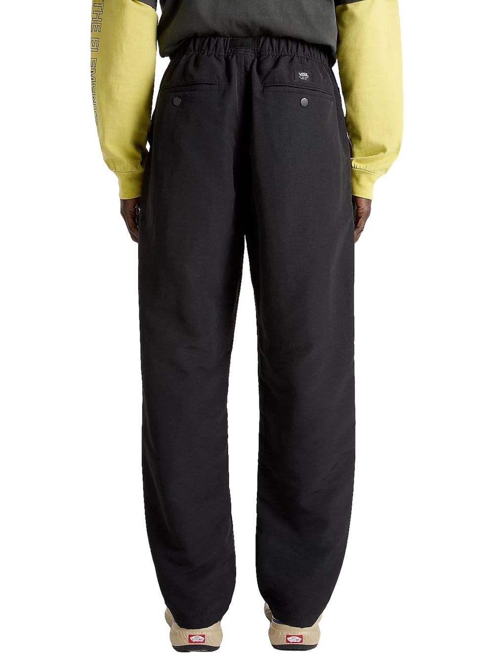 Pantalones deportivos VANS color negro, de corte holgado y cónico con cintura elástica.