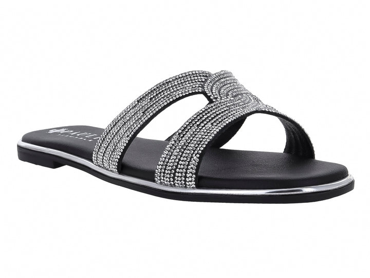 Sandalia plana color negro para mujer con tiras decoradas con brillos plateados y suela delgada.