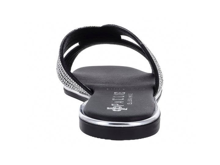 Sandalia plana color negro para mujer con tiras decoradas con brillos plateados y suela delgada.