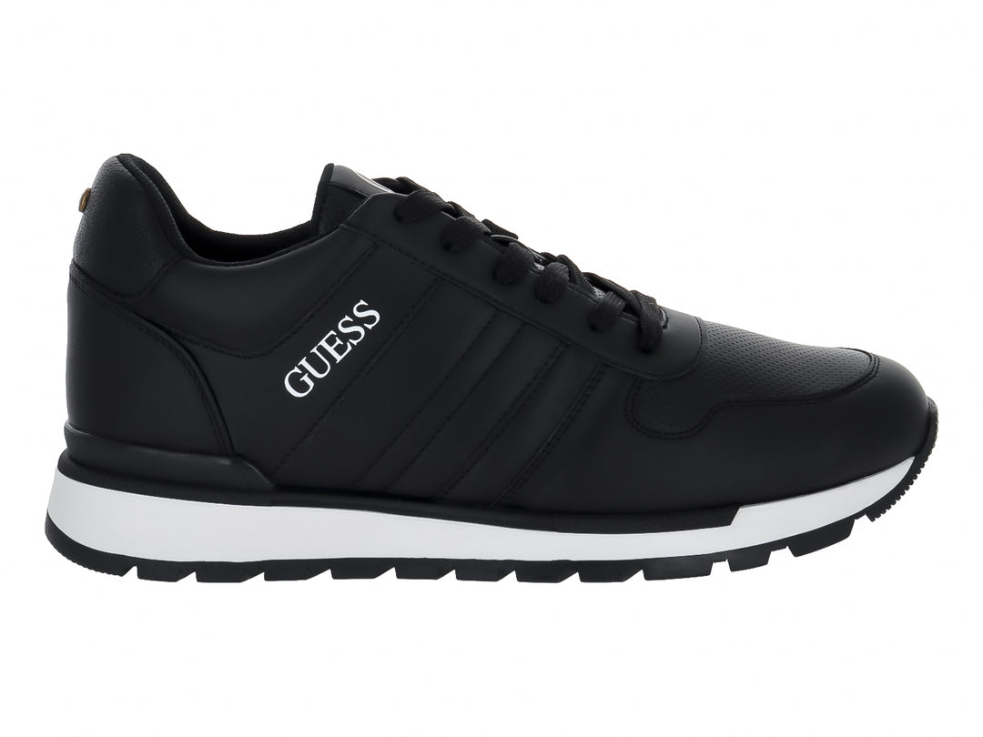 Tenis deportivos Guess color negro con suela blanca y logotipo blanco en el lateral.