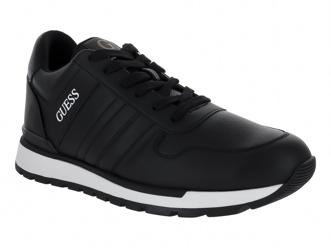 Tenis deportivos Guess color negro con suela blanca y logotipo blanco en el lateral.