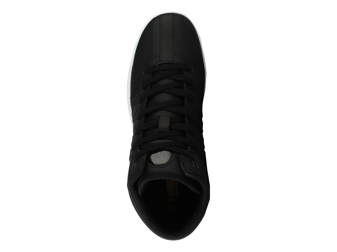 Tenis K-Swiss Court Pro Chukka color negro con suela blanca y diseño de corte alto.