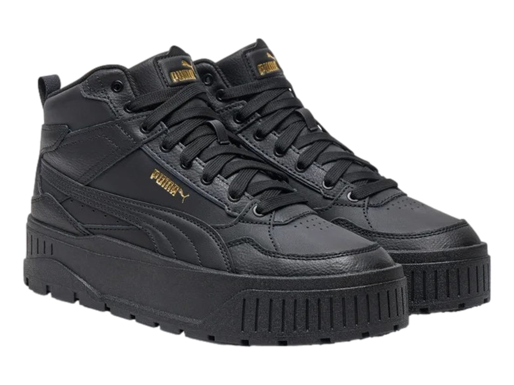 Tenis PUMA Carmen II Idol Mid en color negro con detalles dorados y suela de plataforma gruesa.