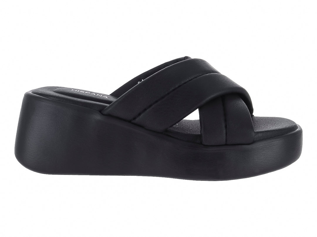 Sandalia de plataforma color negro con tiras cruzadas.