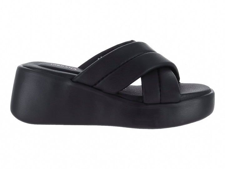 Sandalia de plataforma color negro con tiras cruzadas.