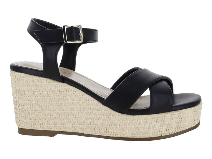 Sandalia de plataforma cuña color negro con base de yute beige y correa al tobillo.