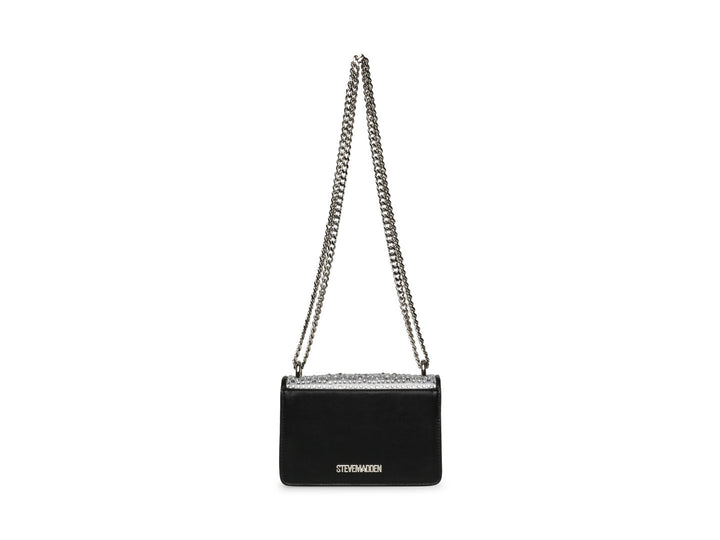 Bolso negro de Steve Madden con cadena plateada, detalles de pedrería brillante y un adorno metálico en forma de ave.