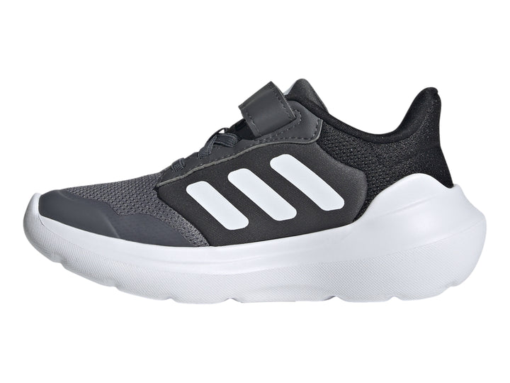 Tenis deportivos Adidas Tensaur Run 2.0 color gris con suela blanca y correa de velcro.