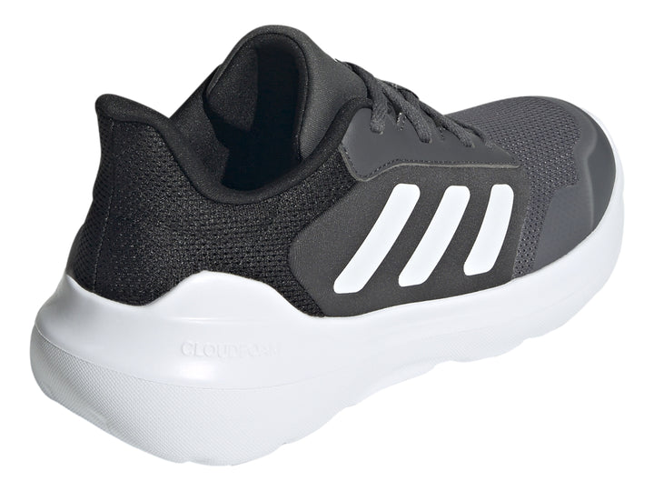 Tenis deportivos Adidas Tensaur Run 2.0 color gris con franjas y suela blanca.
