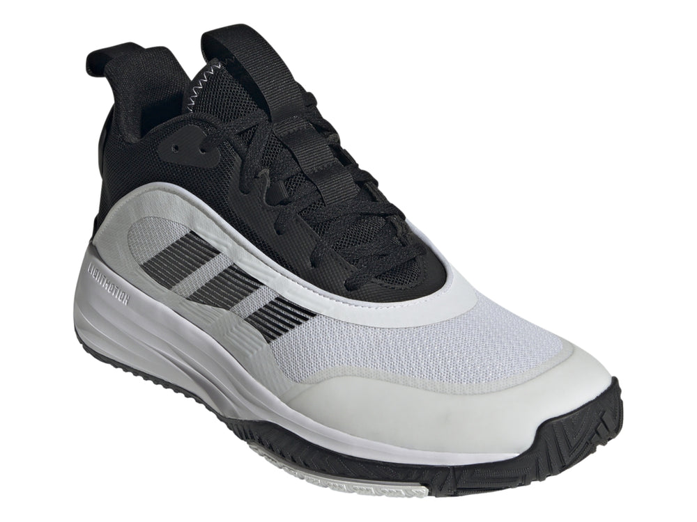 Tenis de baloncesto Adidas OwnTheGame 3.0 en colores blanco y negro con diseño deportivo.