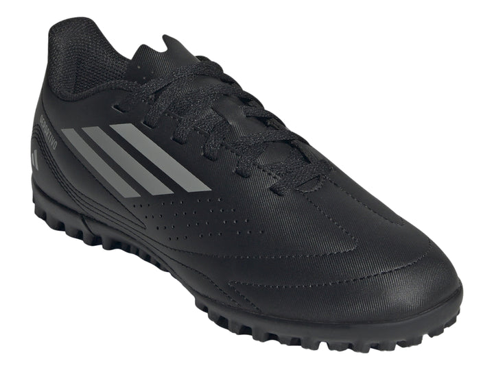 Zapato de fútbol Adidas Deportivo III TF en color negro con franjas grises y suela para césped sintético.