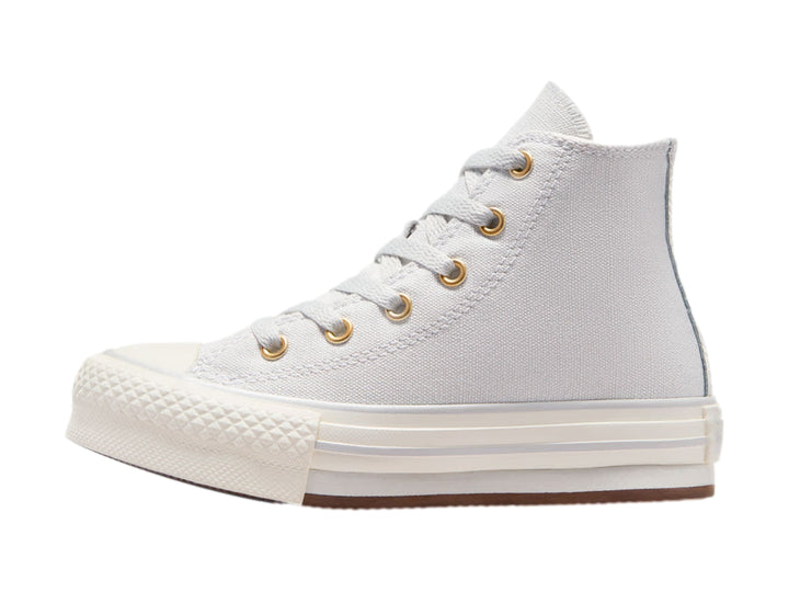 Tenis Converse Chuck Taylor All Star de bota alta en color gris claro con plataforma blanca y detalles dorados.