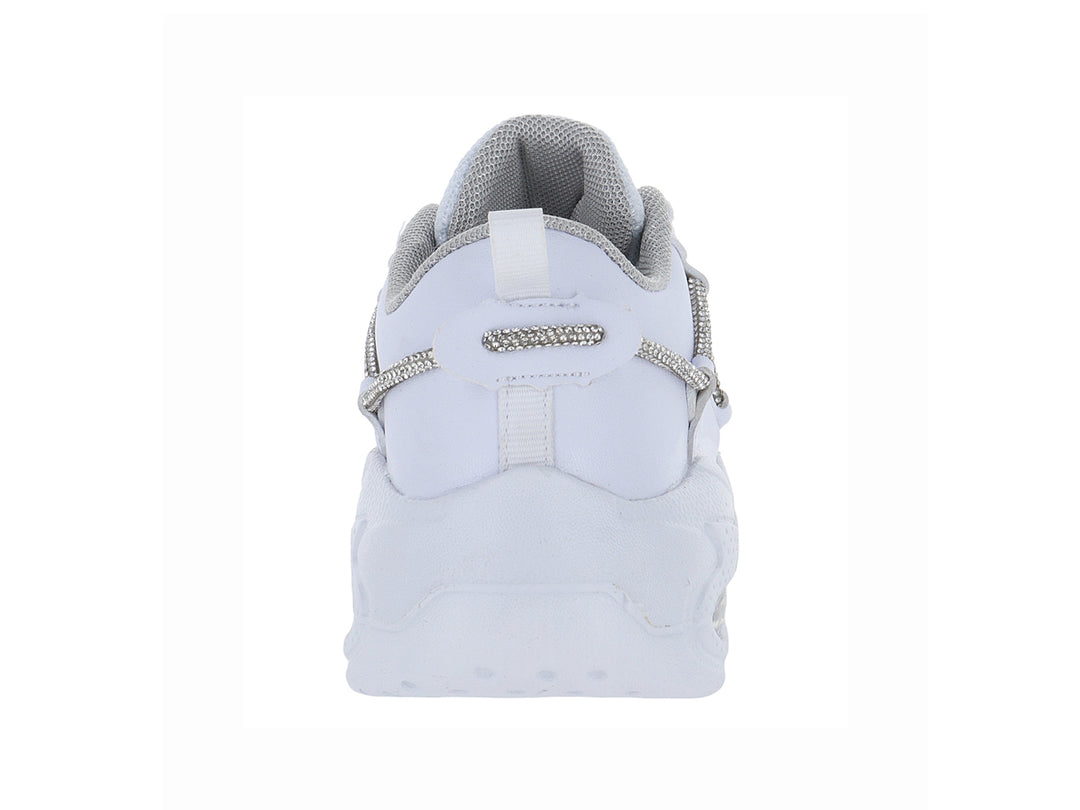 Tenis blancos para Niño o Niña con detalles brillantes en plata y suela gruesa.