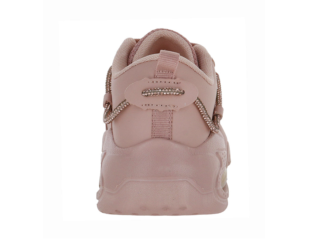 Tenis deportivos para niño o niña en color maquillaje con suela de plataforma y detalle de cámara de aire.