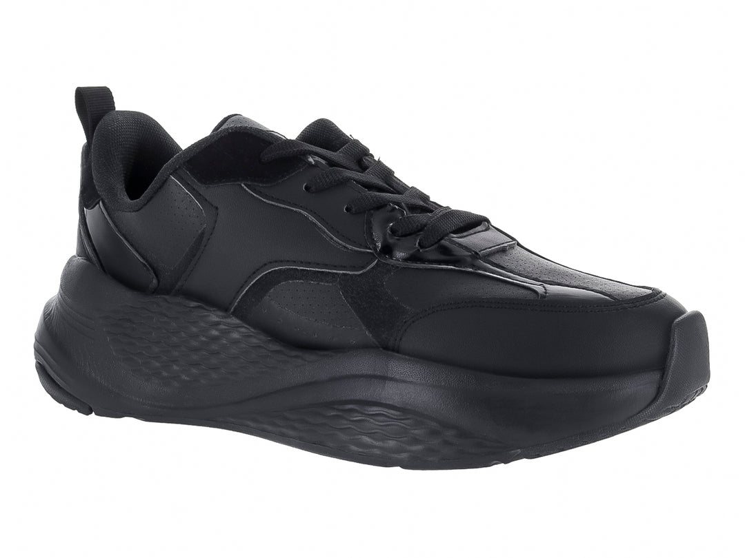 Tenis deportivos color negro con detalles brillantes y suela gruesa texturizada.