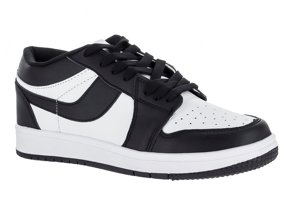 Tenis MAKENA de corte bajo en colores blanco y negro con suela blanca y cordones negros.