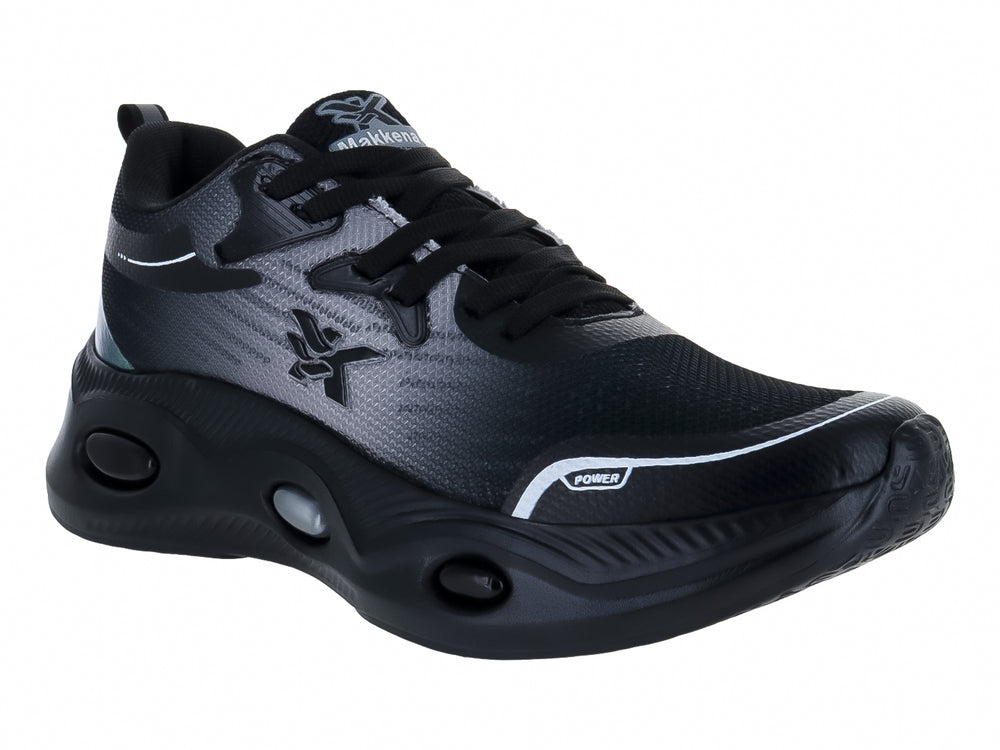 Tenis de baloncesto Makena color negro con detalles en verde y blanco.