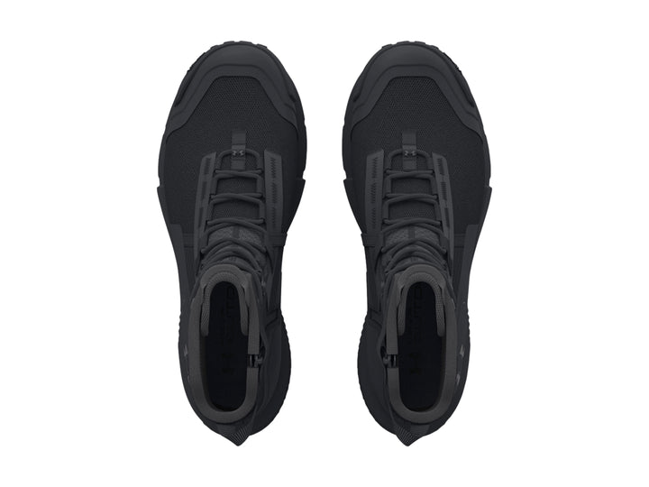 Bota deportiva Under Armour Charged Valsetz de color negro, diseño táctico con caña alta y suela resistente.