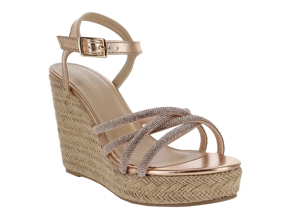 Sandalia de cuña color oro rosa con tiras brillantes y plataforma tejida.