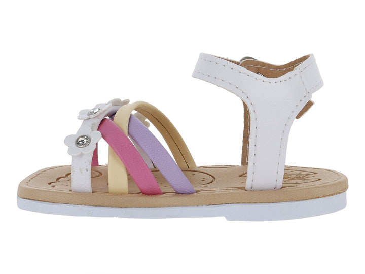 Sandalia infantil blanca con tiras en colores pastel y adornos de flores pequeñas.