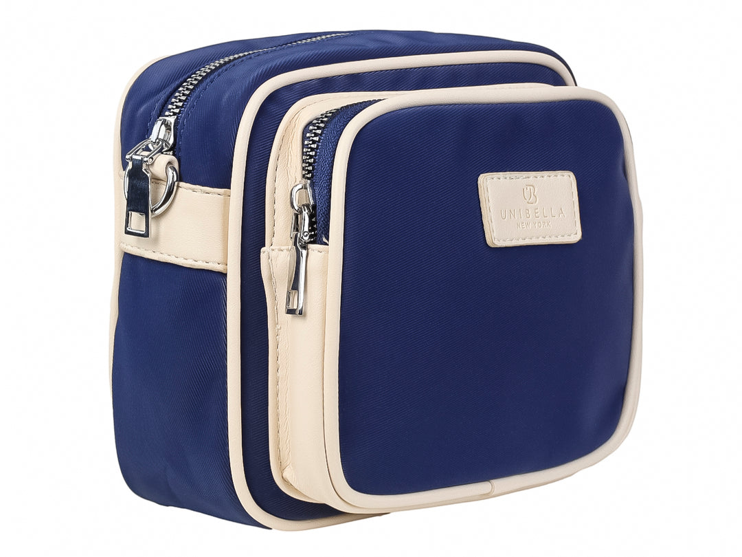 Bolso pequeño azul con ribetes blancos y logotipo de UNIBELLA al frente.