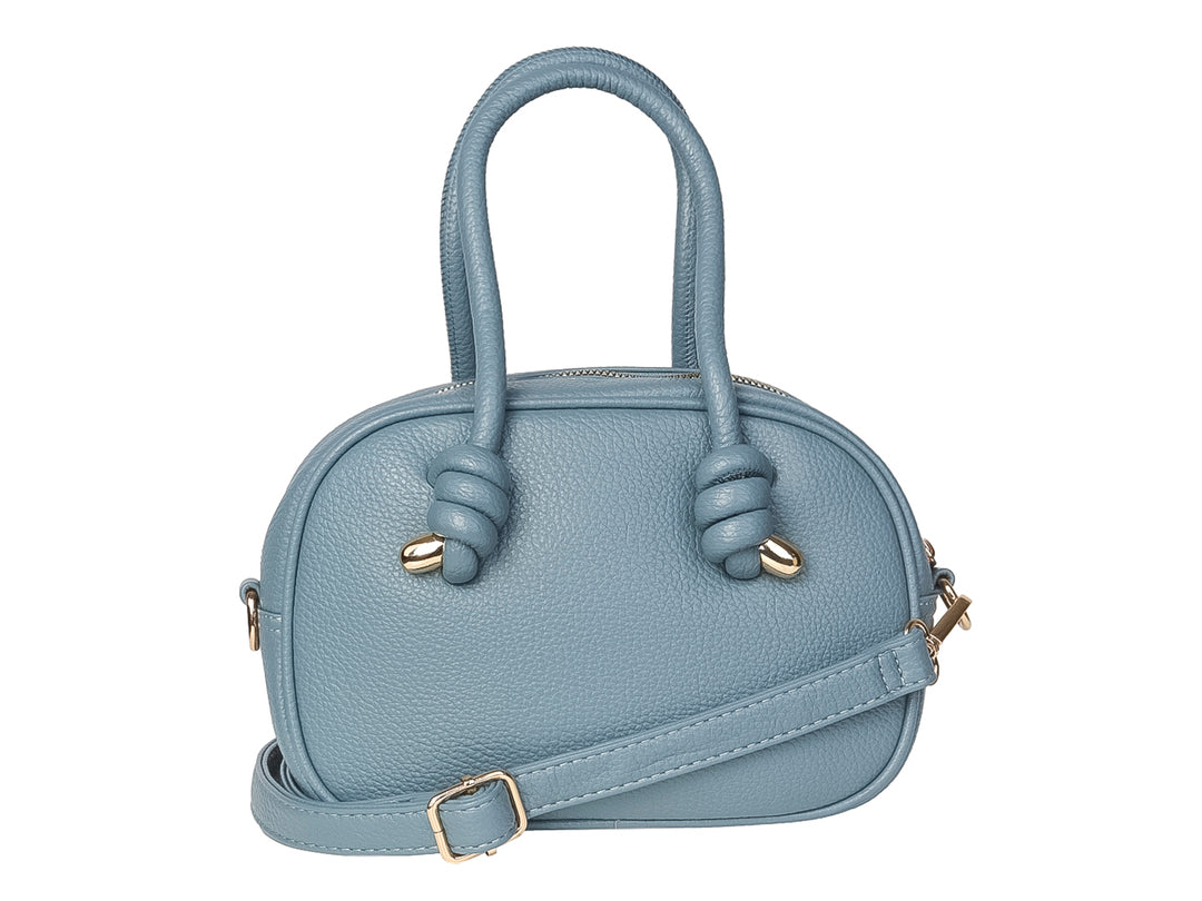 Bolso de mano color azul jeans con asas superiores y detalles dorados en forma de nudos.
