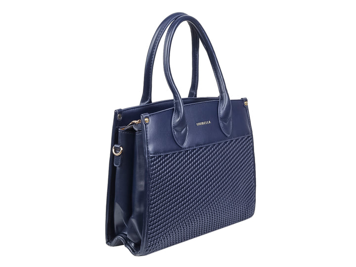 Bolsa de mano color azul marino con sección inferior texturizada y asas cortas.