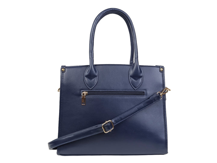 Bolsa de mano color azul marino con sección inferior texturizada y asas cortas.