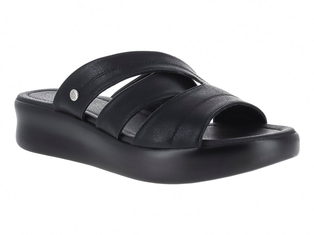Sandalia negra de plataforma para mujer con correas cruzadas y suela gruesa.
