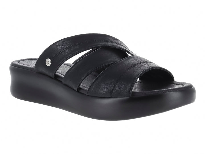 Sandalia negra de plataforma para mujer con correas cruzadas y suela gruesa.