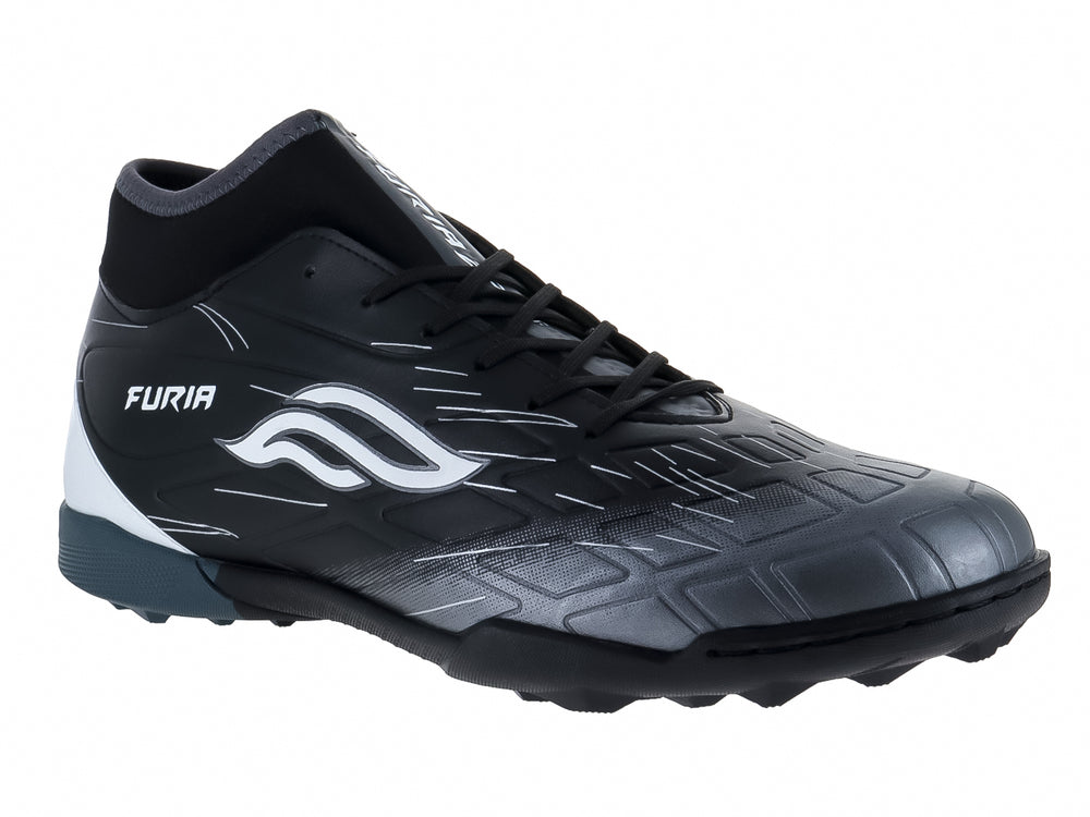 Calzado de fútbol Furia Speed TF color negro con detalles en blanco y suela para pasto sintético.