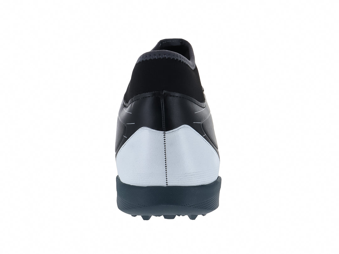 Calzado de fútbol Furia Speed TF color negro con detalles en blanco y suela para pasto sintético.
