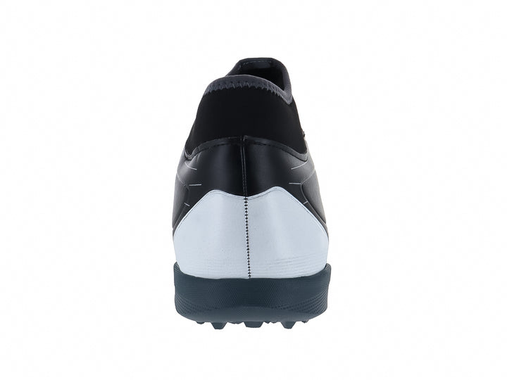 Calzado de fútbol Furia Speed TF color negro con detalles en blanco y suela para pasto sintético.