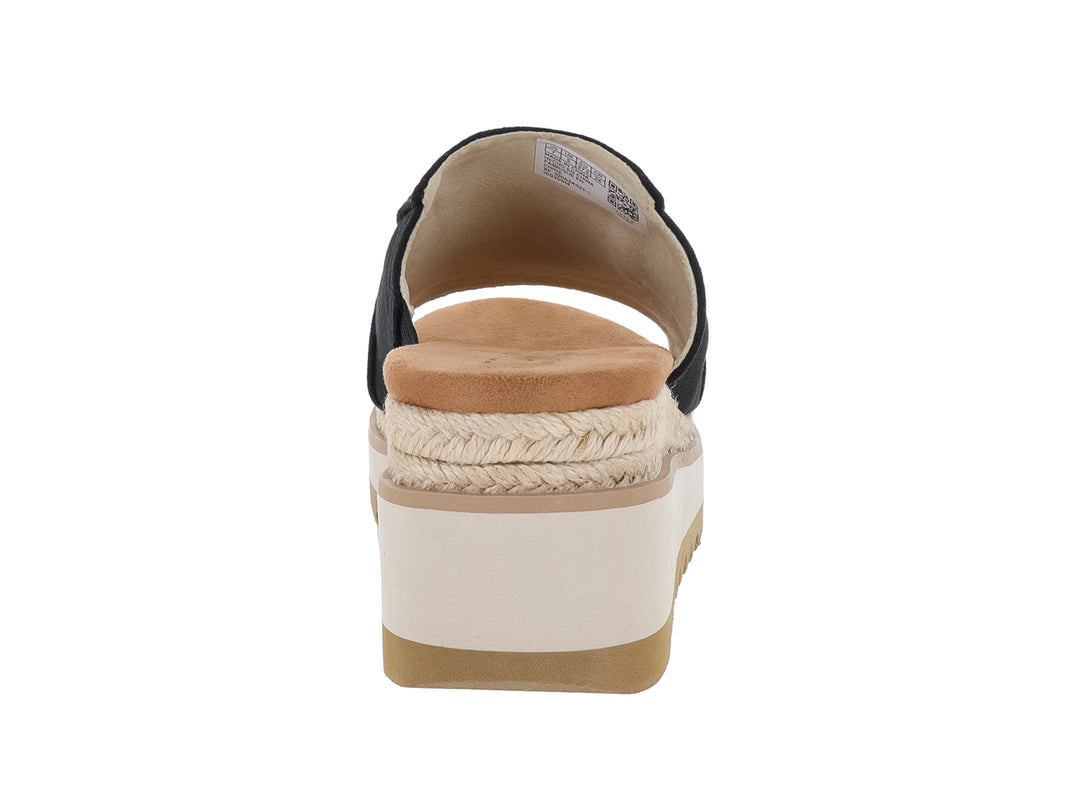 Sandalia TOMS de plataforma color negro con suela blanca y beige y detalle de cuerda.