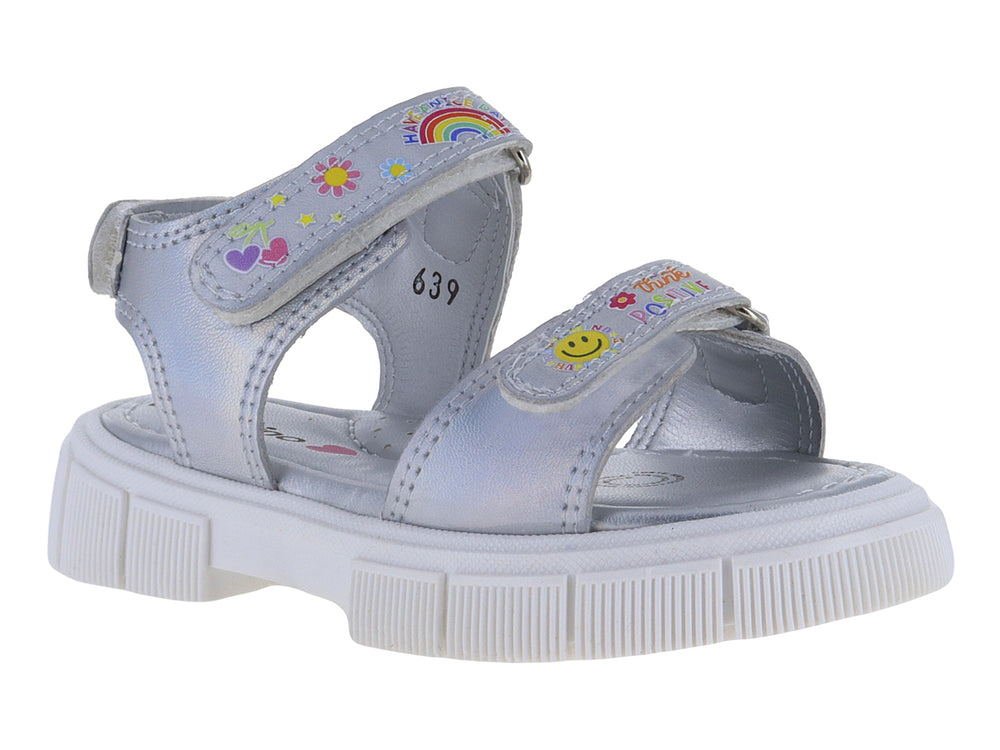 Sandalia infantil color plata con plataforma blanca y detalles decorativos de arcoíris y caritas felices.