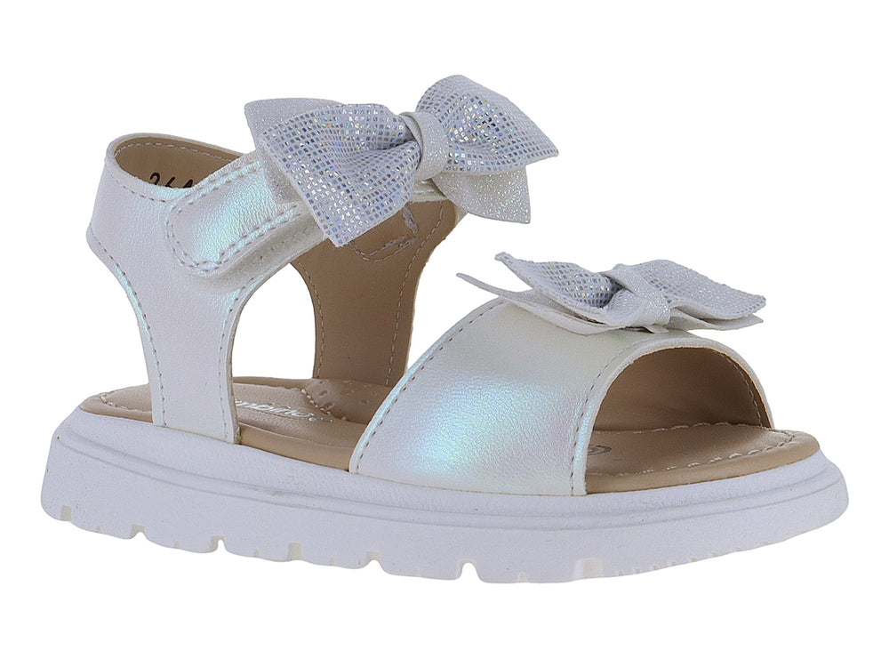 Sandalia blanca para niña con plataforma, detalles de moños y acabado iridiscente.