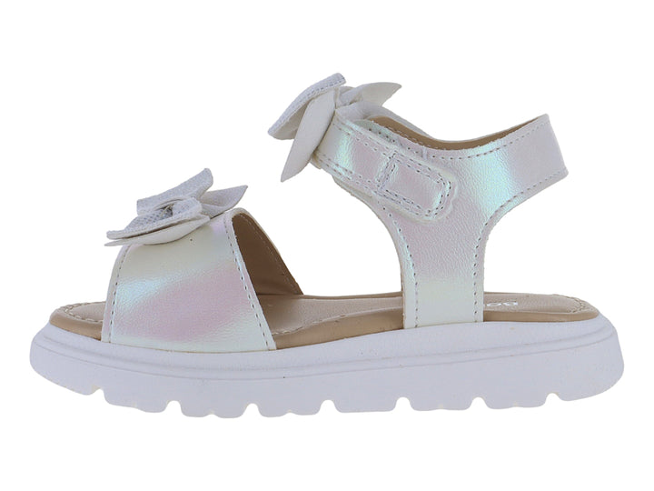 Sandalia blanca para niña con plataforma, detalles de moños y acabado iridiscente.