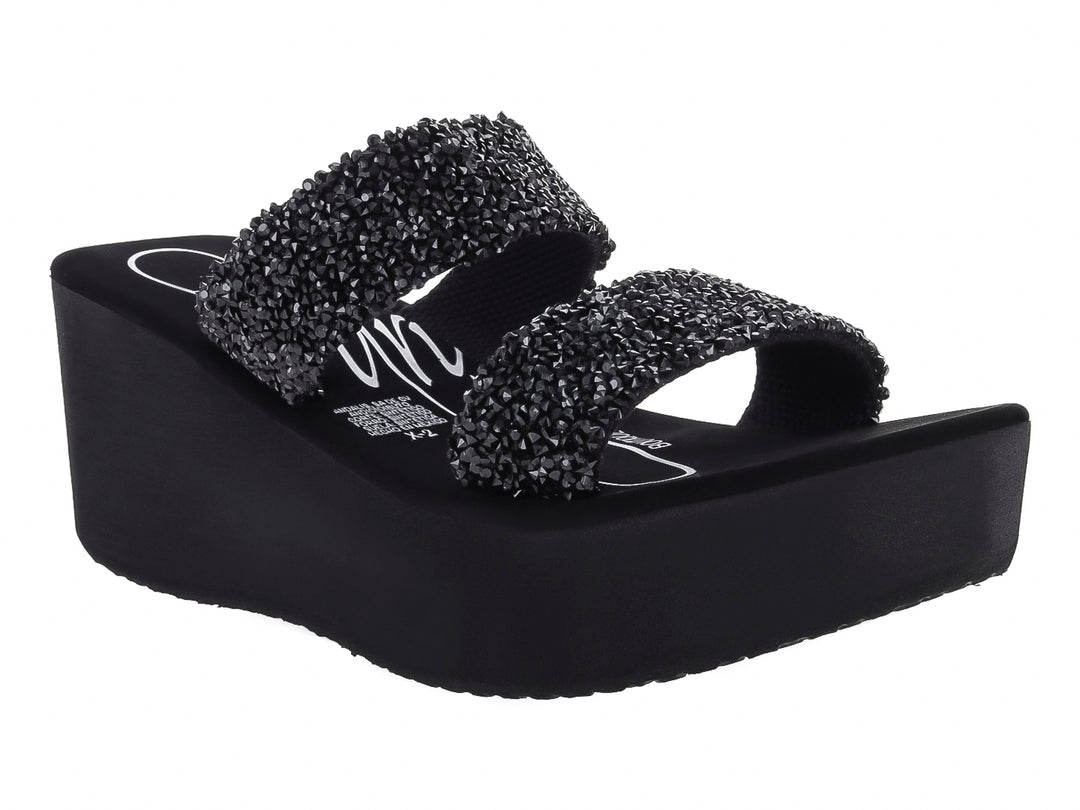 Sandalia de plataforma color negro con dos tiras decoradas con brillo.