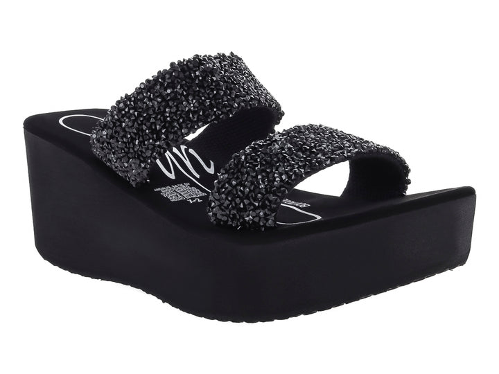 Sandalia de plataforma color negro con dos tiras decoradas con brillo.