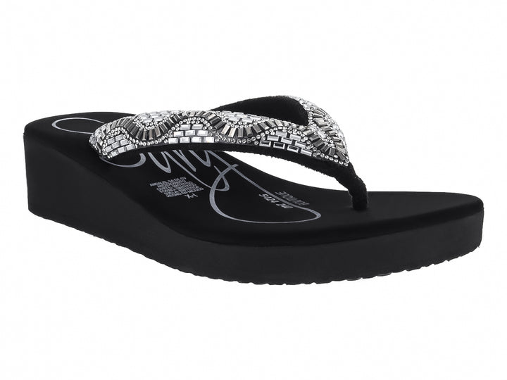 Sandalias negras de plataforma con tira decorada con pedrería plateada brillante.