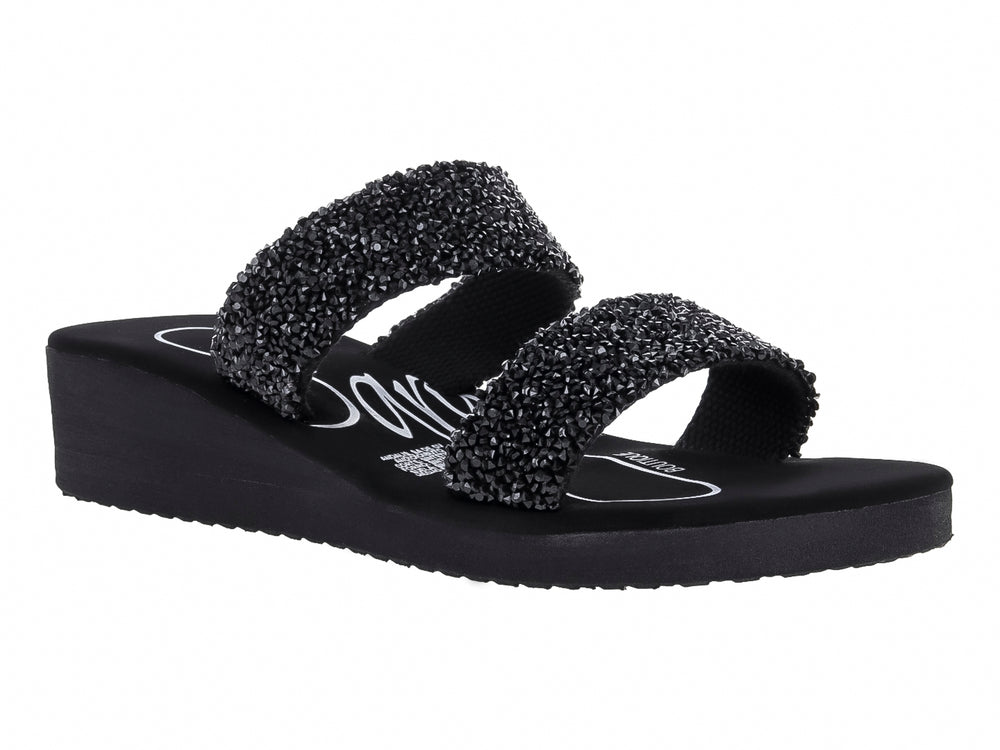 Sandalias negras de plataforma con dos correas decoradas con texturas brillantes.