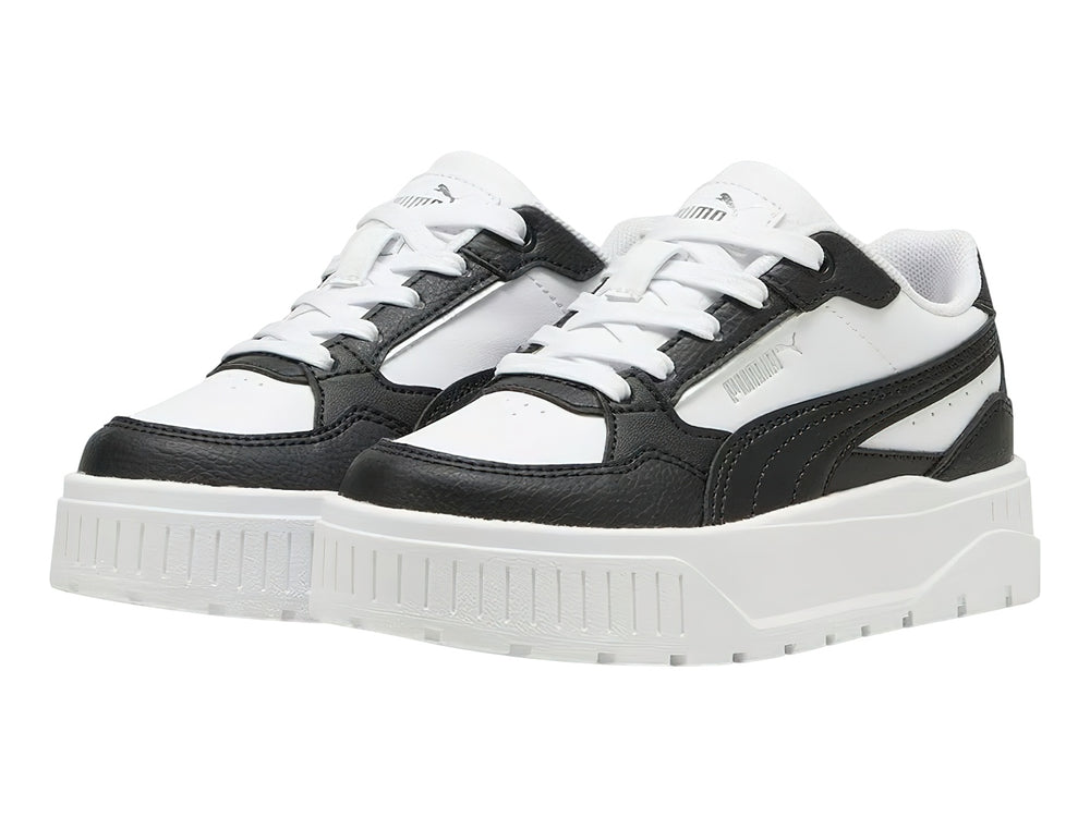 Tenis Puma Carmen II Idol en colores blanco y negro con suela de plataforma blanca.