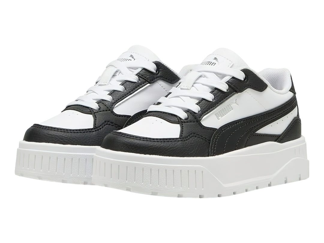 Tenis Puma Carmen II Idol en colores blanco y negro con suela de plataforma blanca.