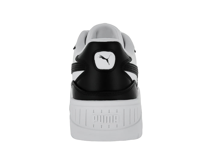 Tenis Puma Carmen II Idol en colores blanco y negro con suela de plataforma blanca.