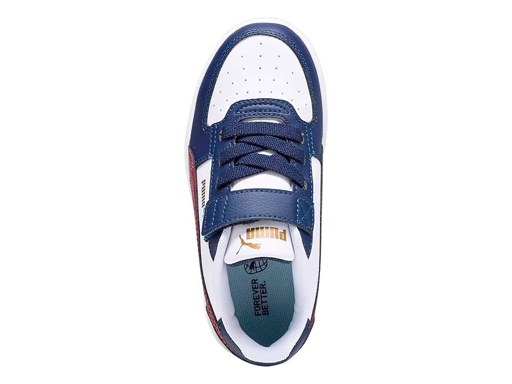 Tenis PUMA Caven 2.0 AC+PS para niño en colores blanco, azul marino y rojo con cierre de velcro.