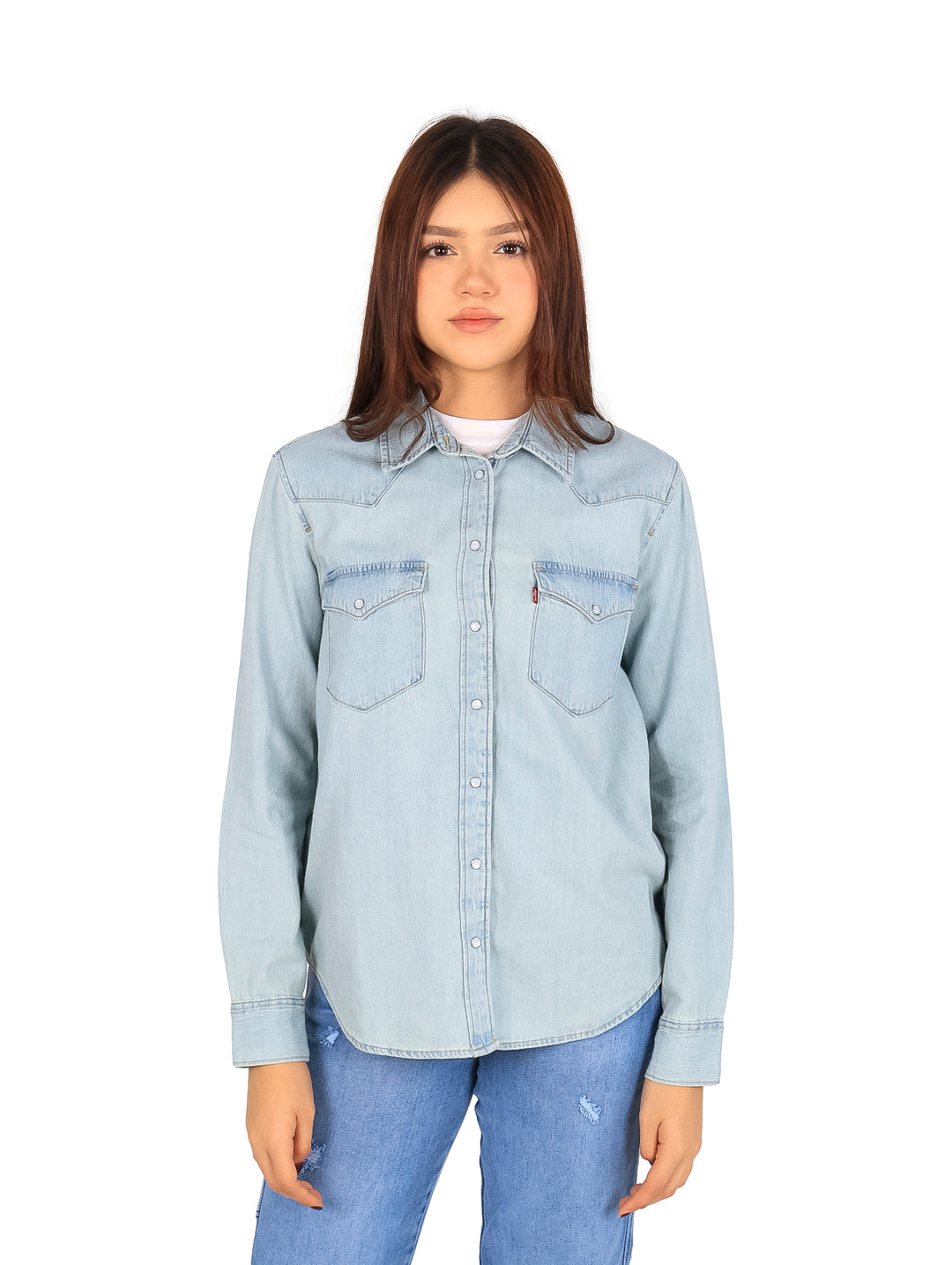 Camisa de mezclilla color azul claro estilo western para Niña con botones y bolsillos frontales.
